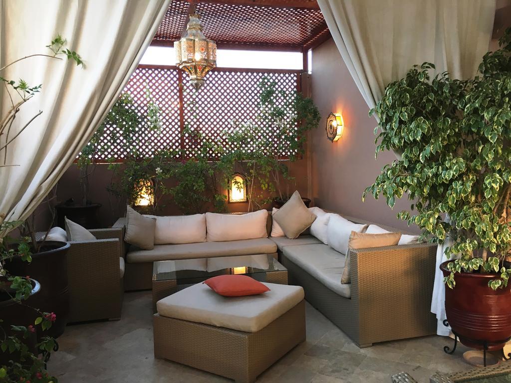 ホテル リヤド ビバ マラケシュ エクステリア 写真 A Moroccan patio